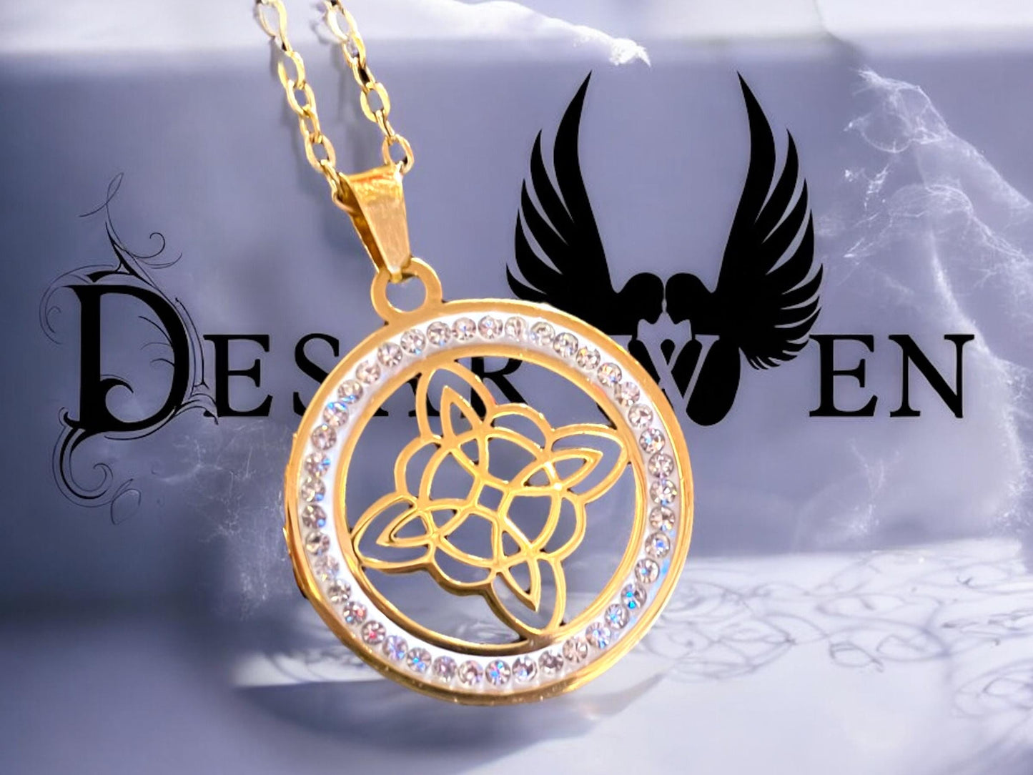 Stainless steel and rhinestone witch's knot pendant