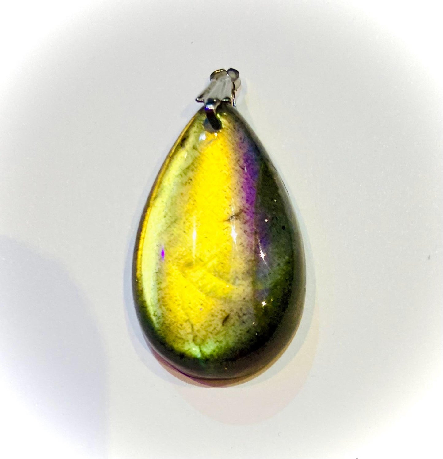 Flat drop pendant with extra reflections of flashing labradorite