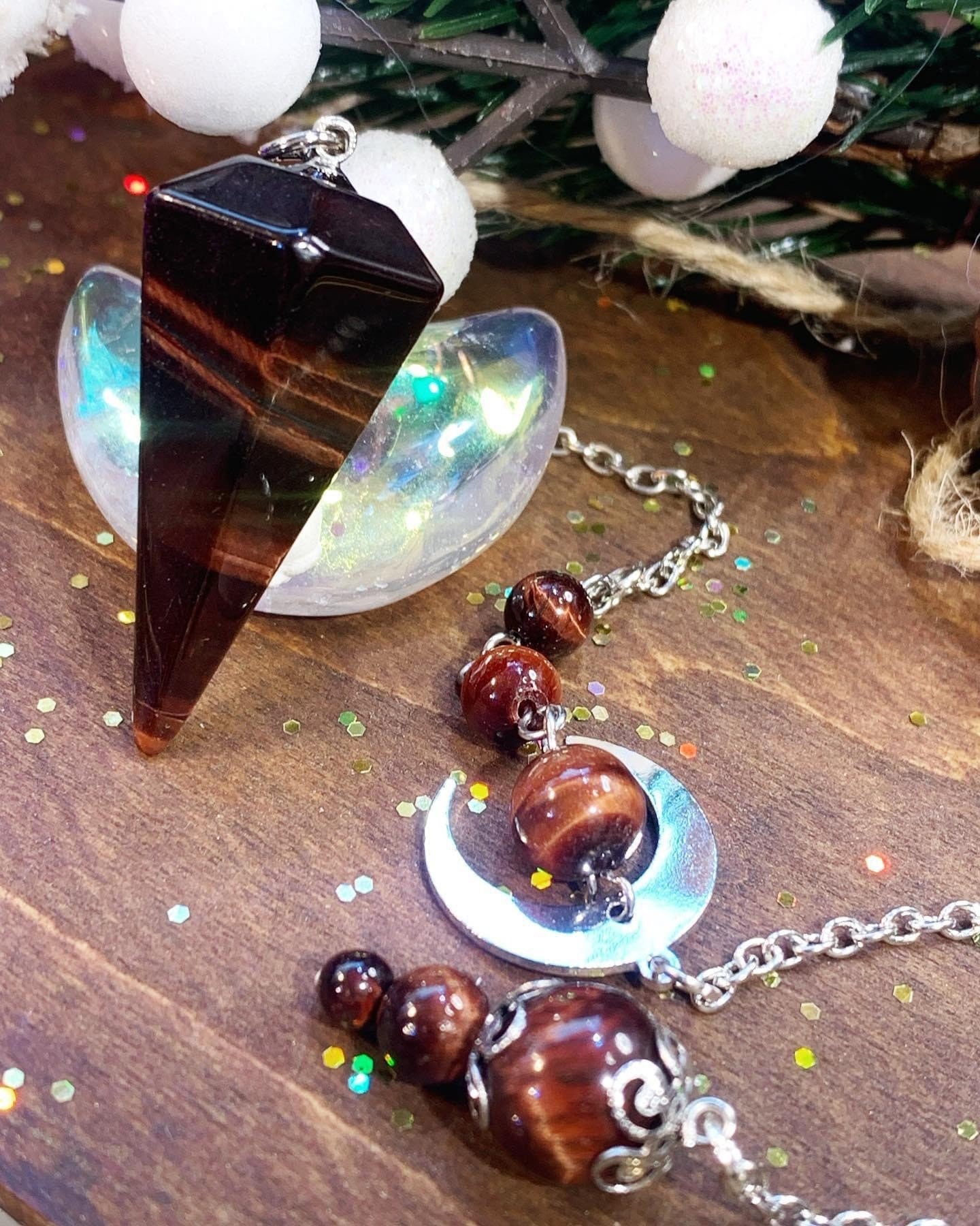 Bull's eye moon phase pendulum