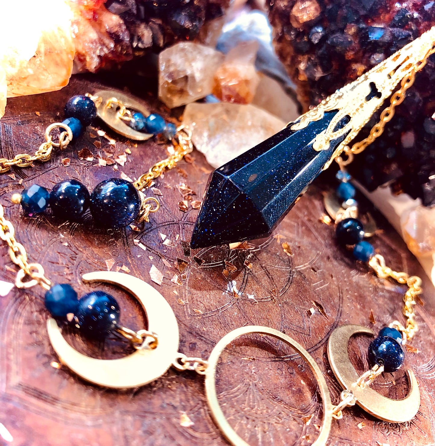 Fairy pendulum with night stone and faceted blue sapphire