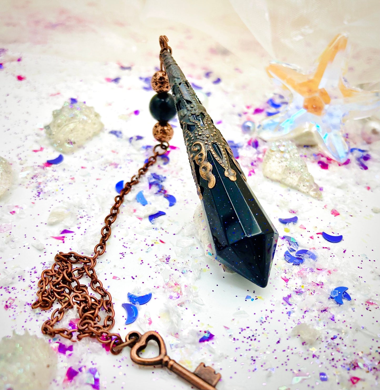 Nightstone and copper pendulum
