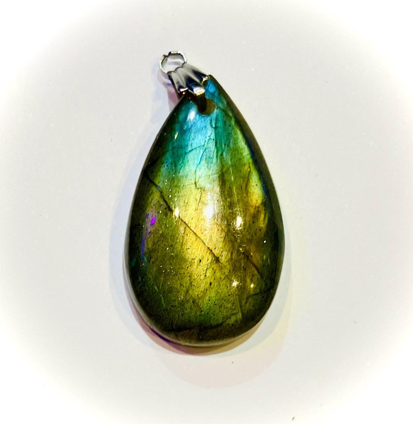 Flat drop pendant with extra reflections of flashing labradorite