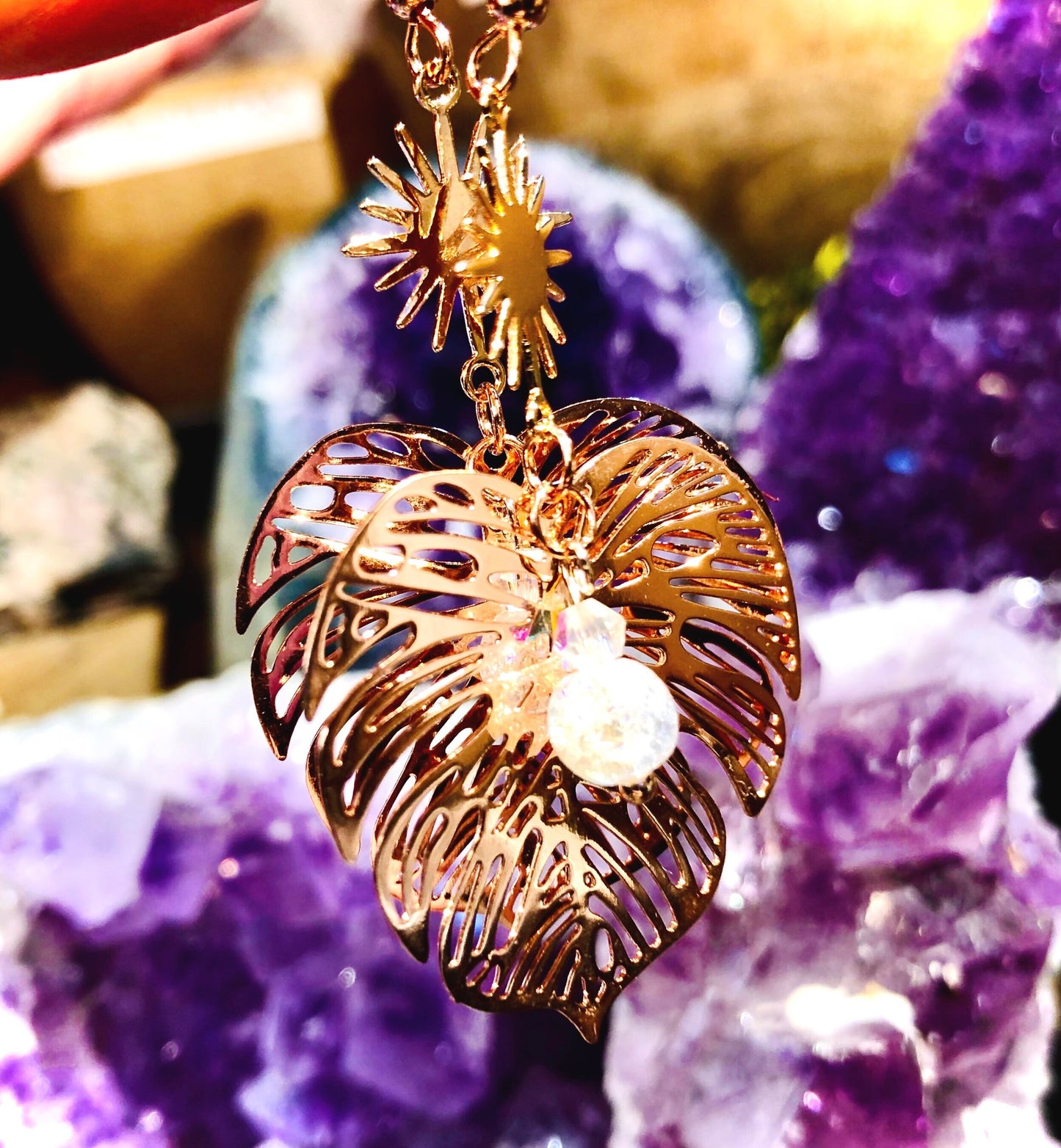 Rose gold filigree and cracked angel aura crystal leaf earring
