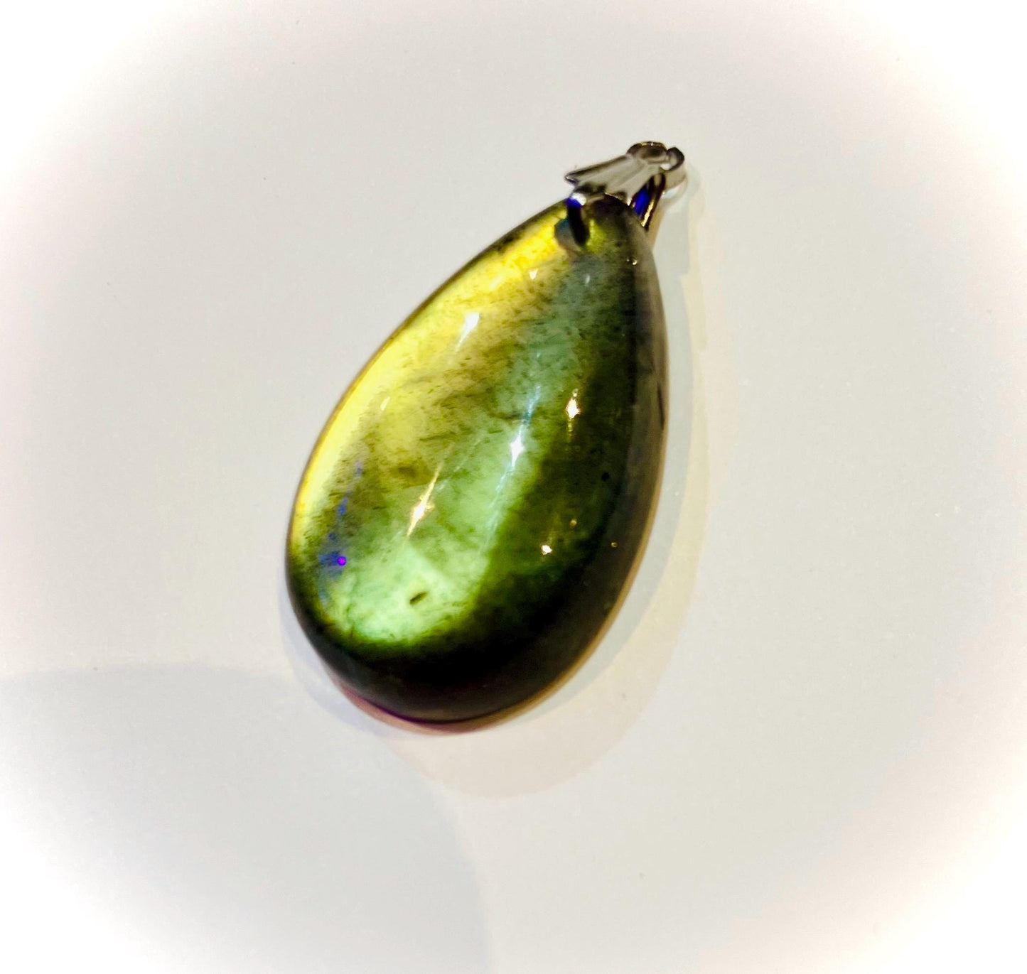 Flat drop pendant with extra reflections of flashing labradorite