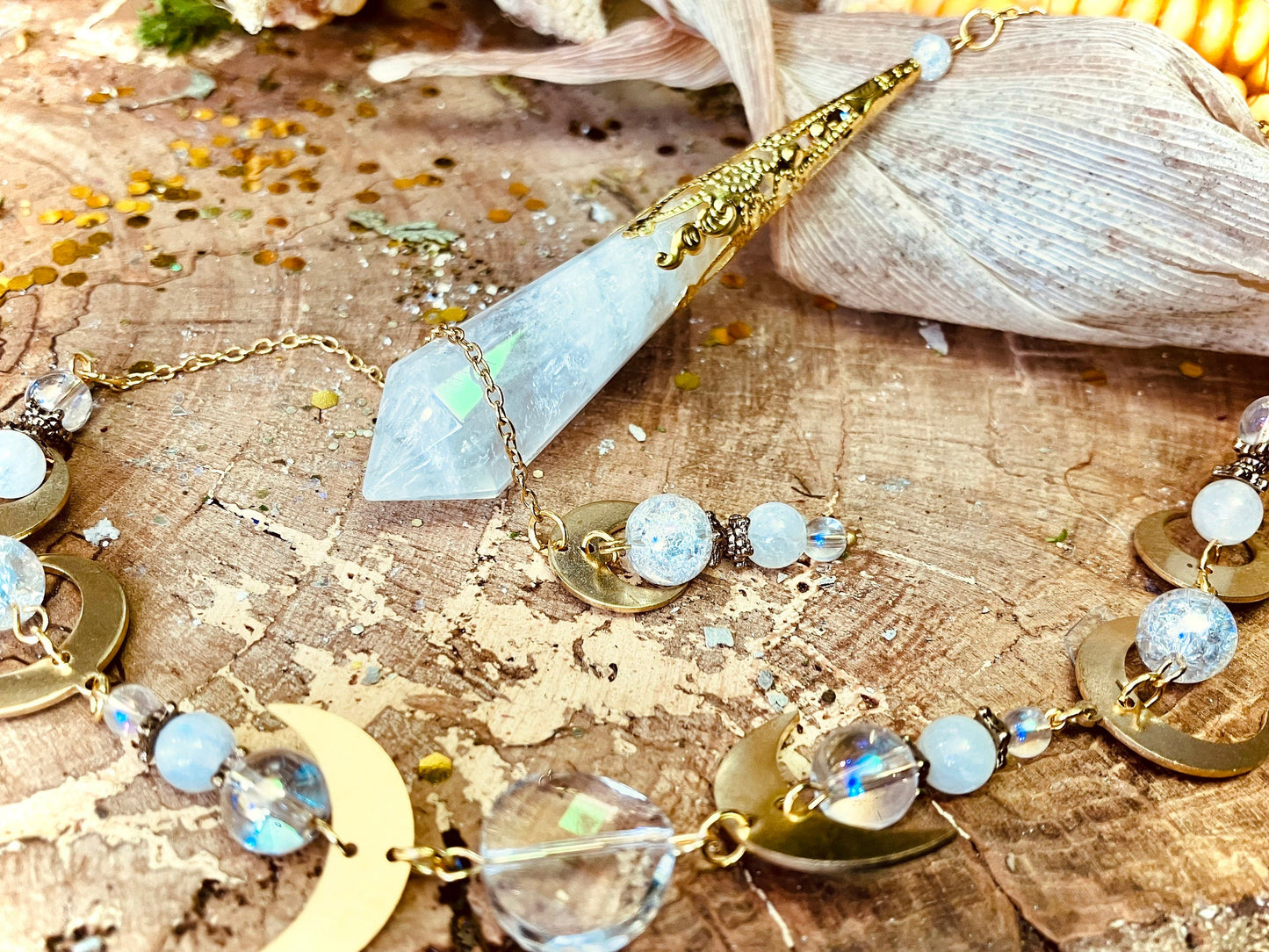 Crystal, moonstone and aura quartz angel pendulum