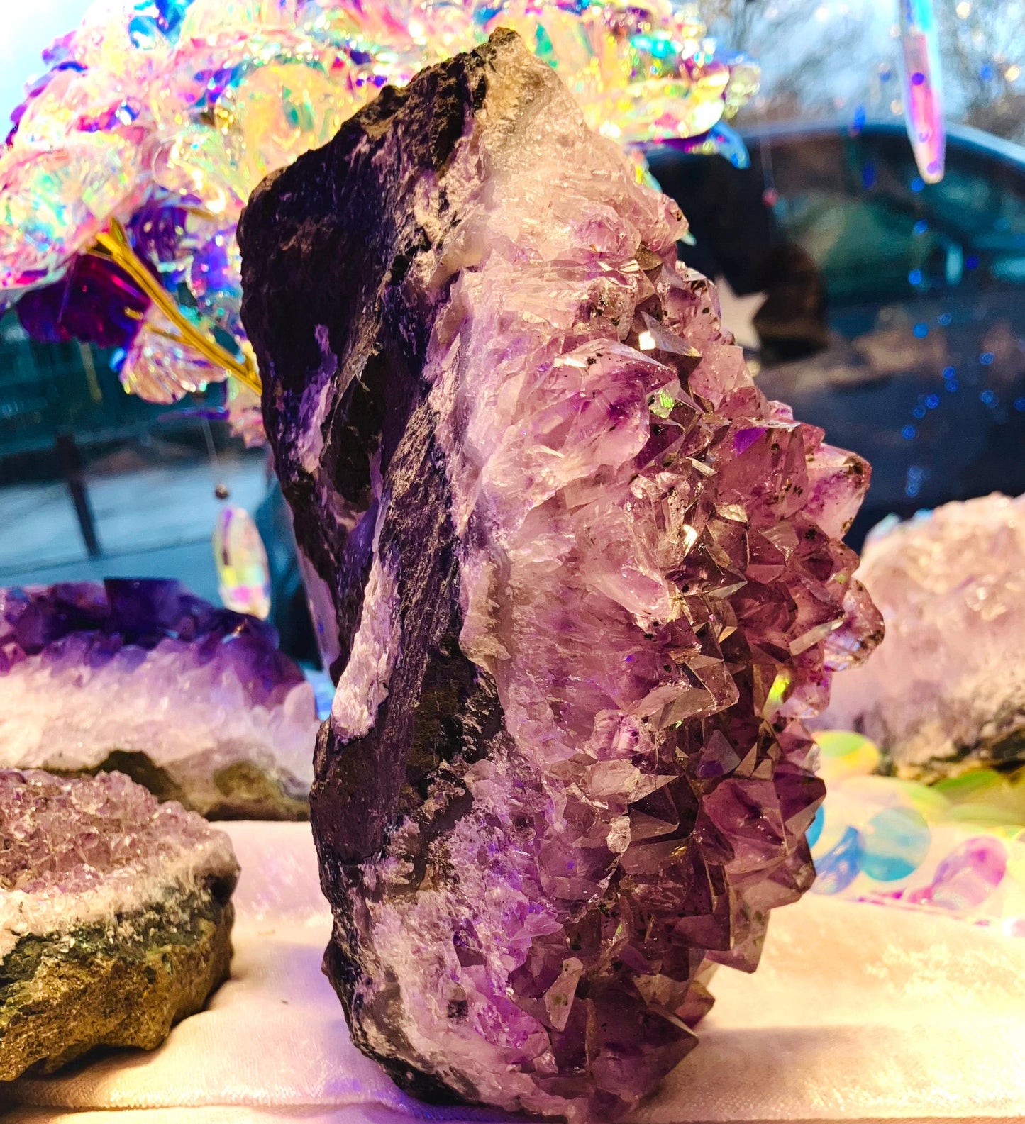 Giant amethyst druse with goethite inclusion