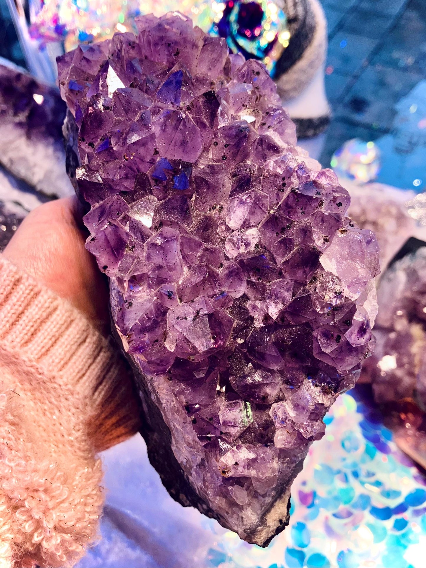 Giant amethyst druse with goethite inclusion