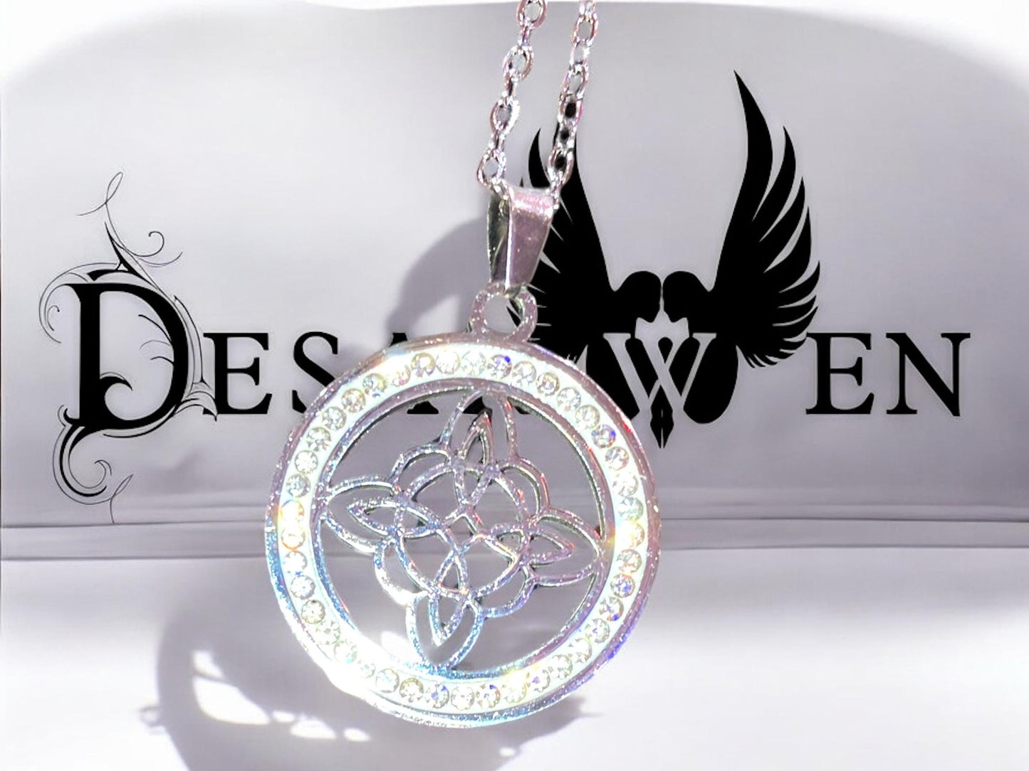 Stainless steel and rhinestone witch's knot pendant