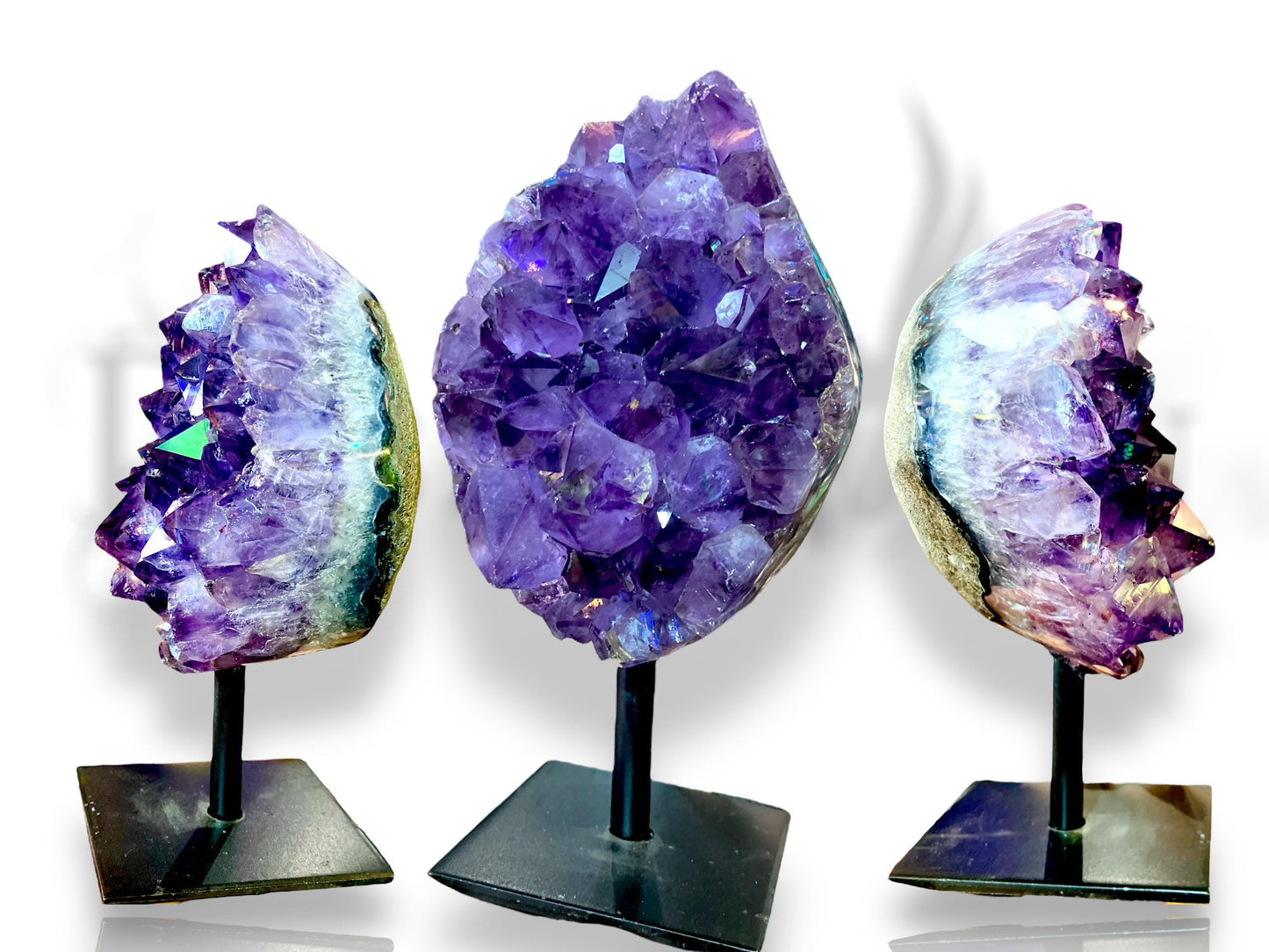 amethyst geode on iron base