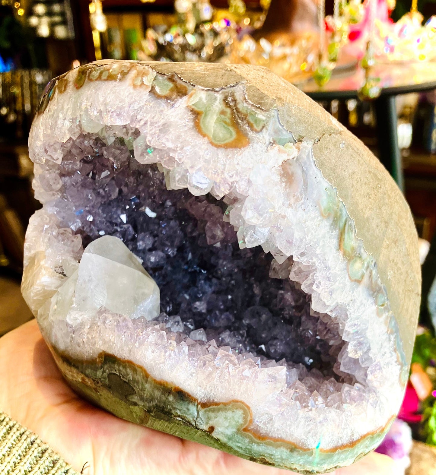 Large amethyst geode with calcite