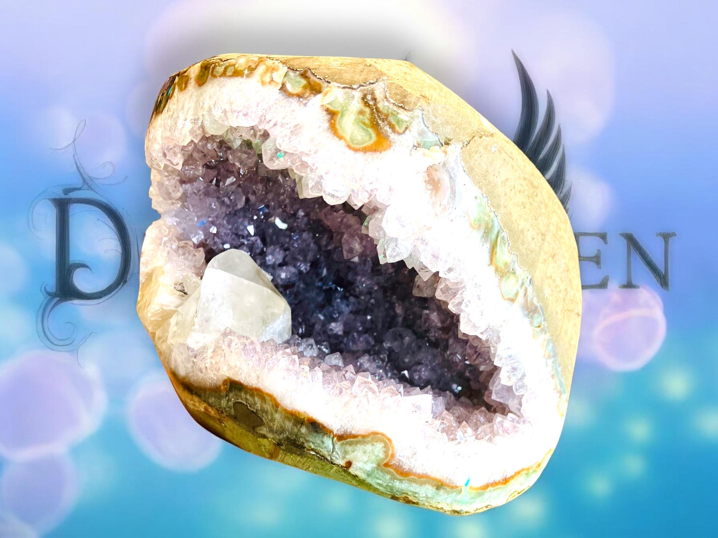 Large amethyst geode with calcite