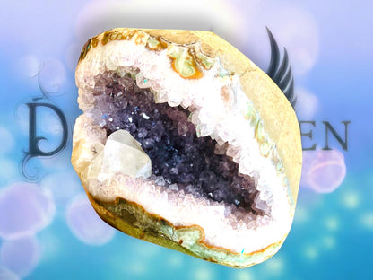 Large amethyst geode with calcite