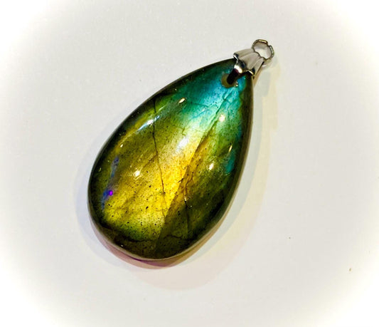 Flat drop pendant with extra reflections of flashing labradorite