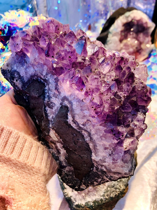 Giant amethyst druse with goethite inclusion