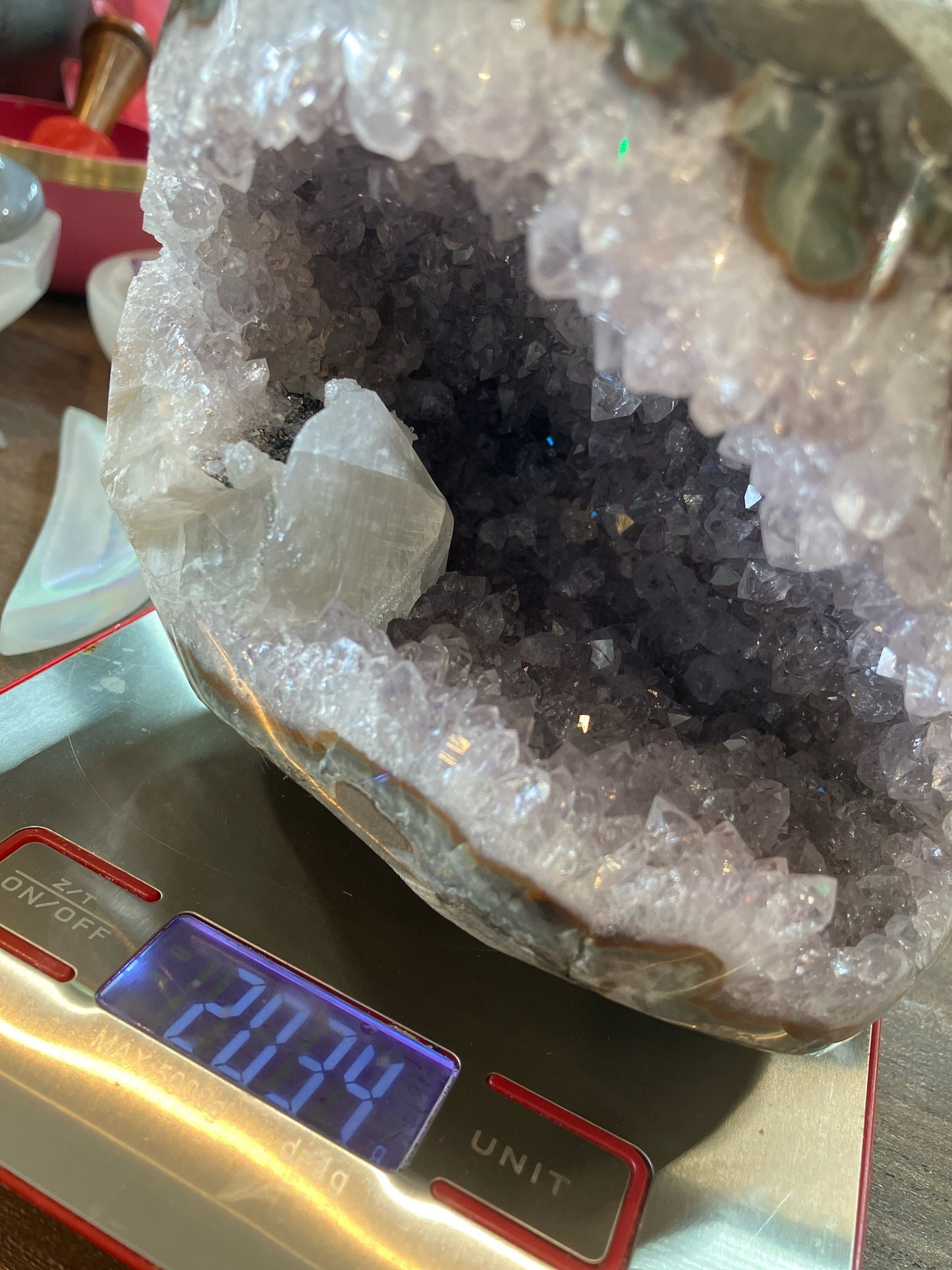 Large amethyst geode with calcite
