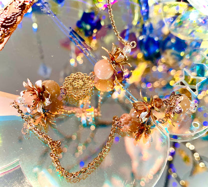 Pendule quartz rose et pierre de soleil