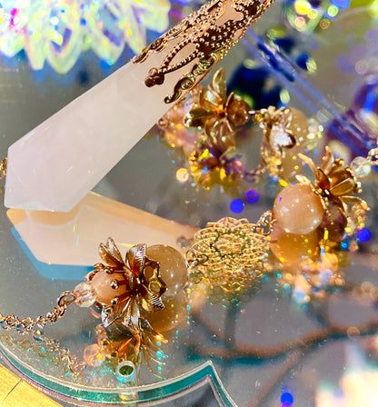 Pendule quartz rose et pierre de soleil
