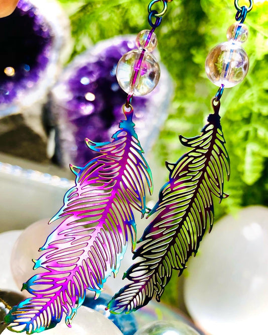 Filigree feather earring in iridescent metal and aura crystal