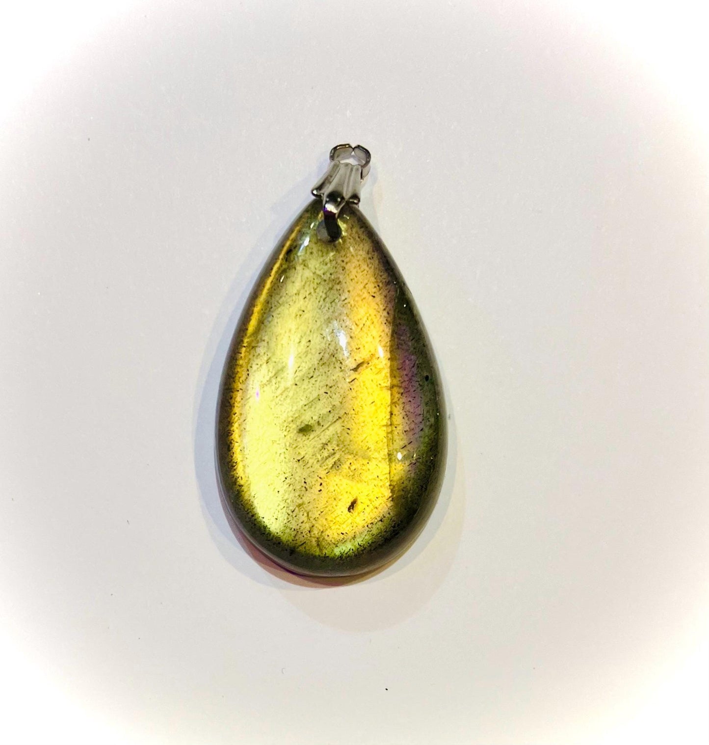 Flat drop pendant with extra reflections of flashing labradorite