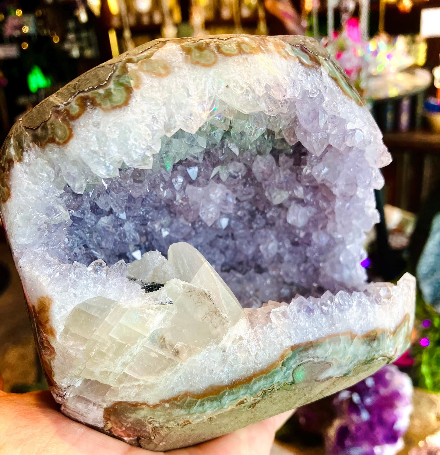 Large amethyst geode with calcite