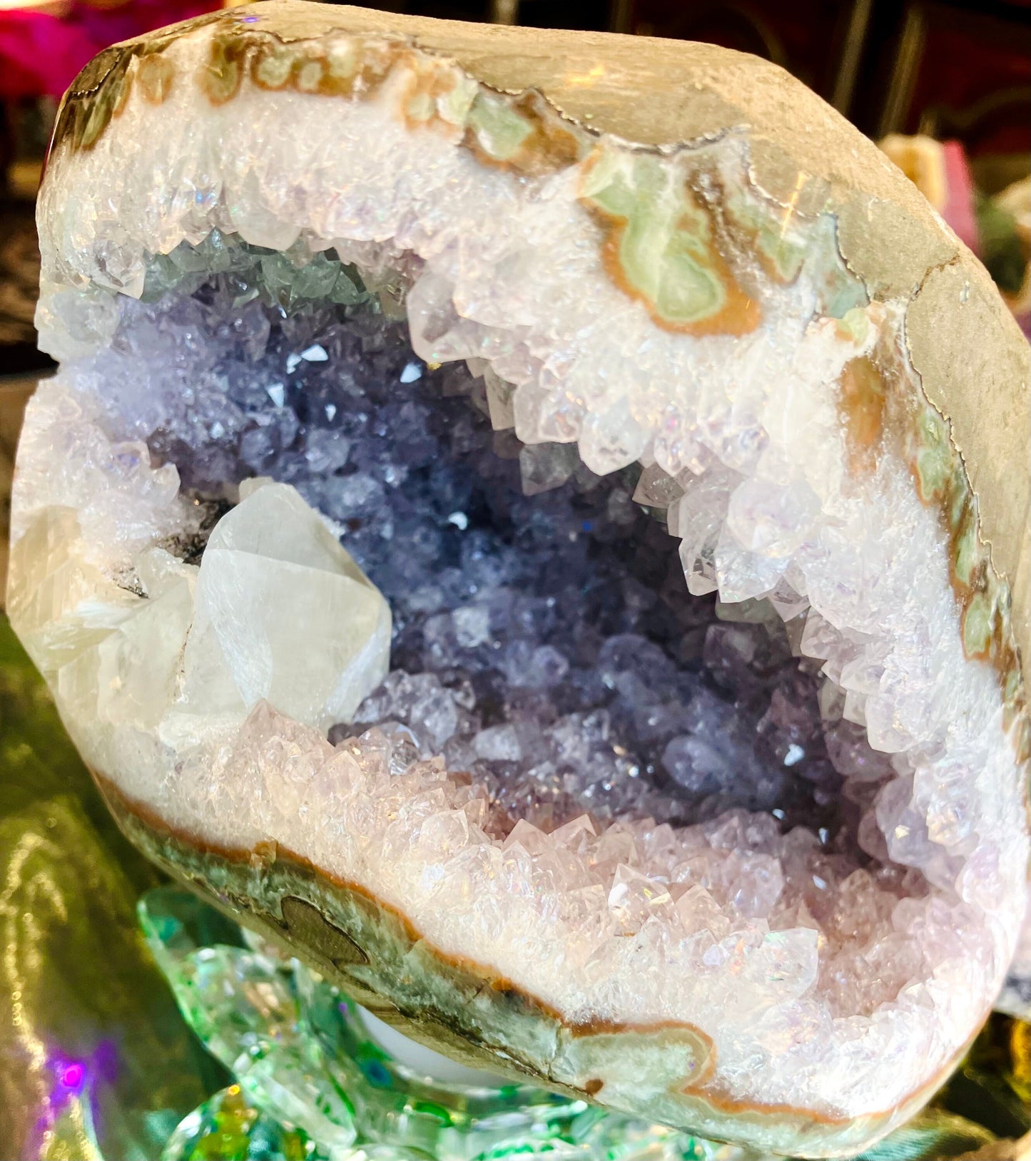 Large amethyst geode with calcite