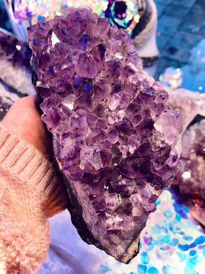Giant amethyst druse with goethite inclusion