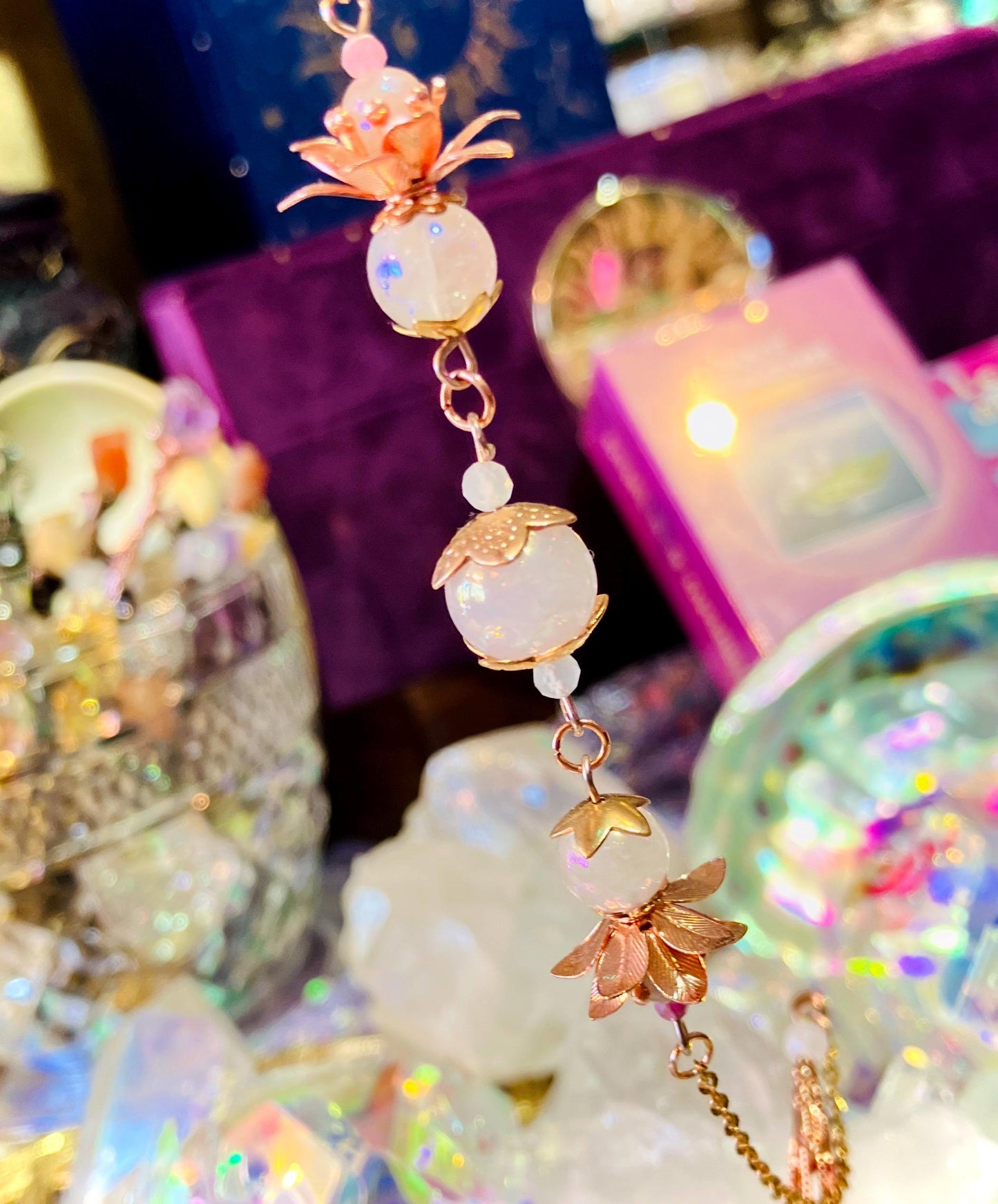 Crystal and aura quartz pendulum with cracked angel flower
