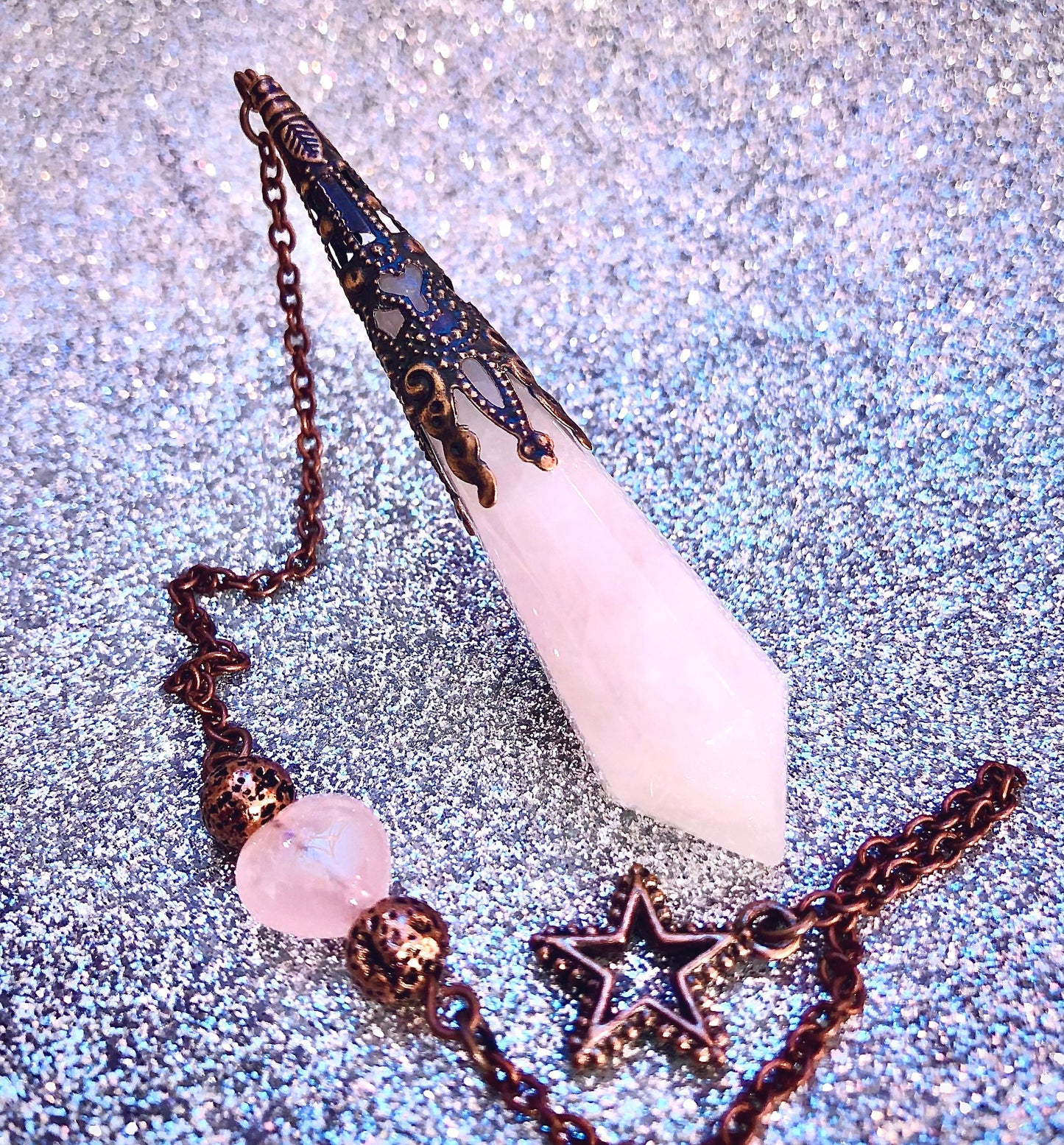 Pendule cuivre et quartz rose