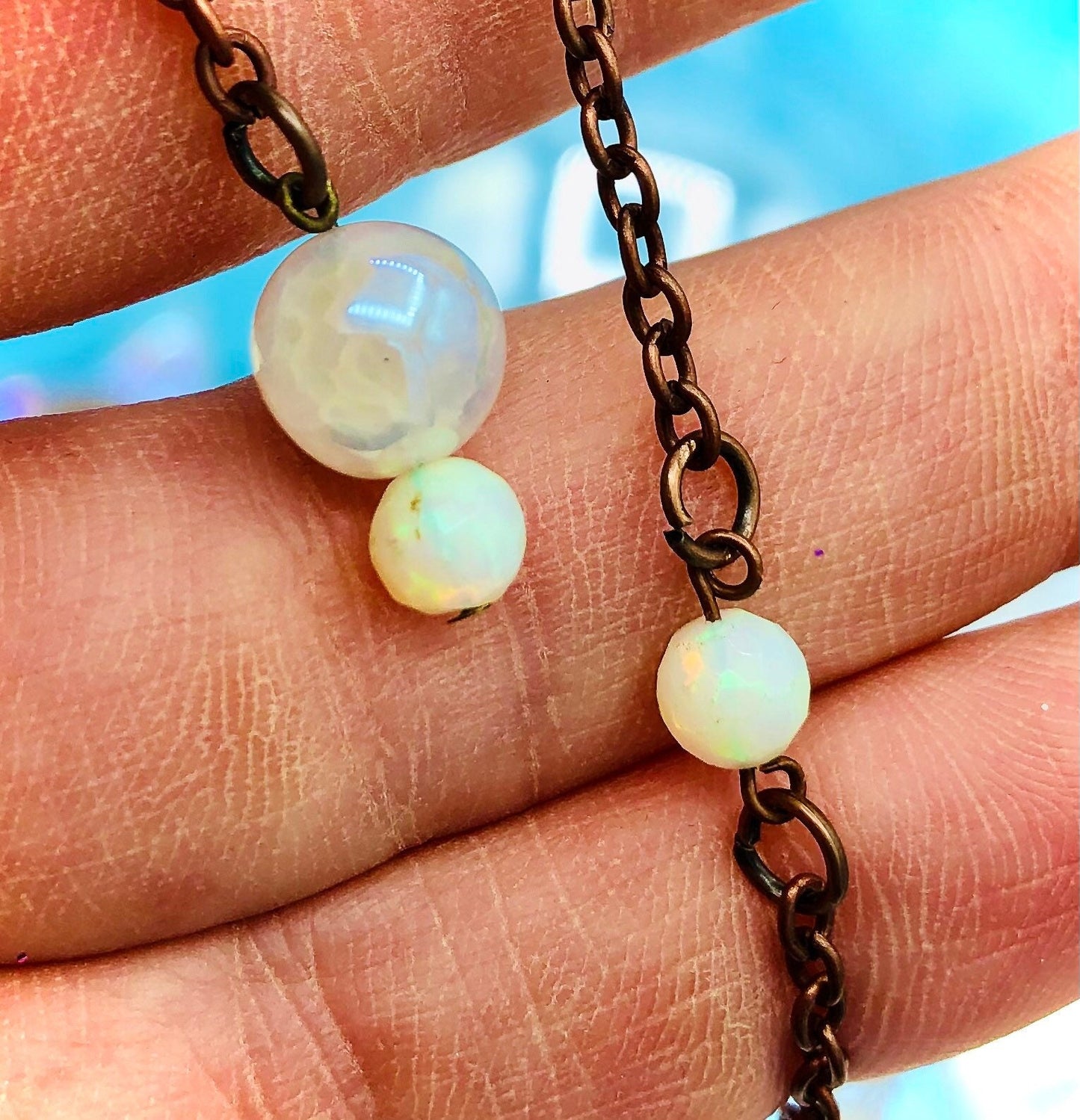 Pendule cristal aura et opales éthiopiennes