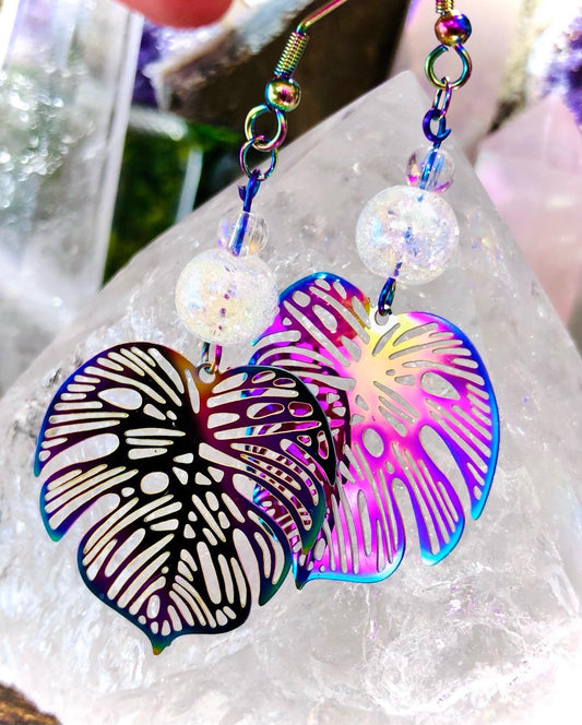 Filigree metal and cracked rock crystal aura angel leaf earring