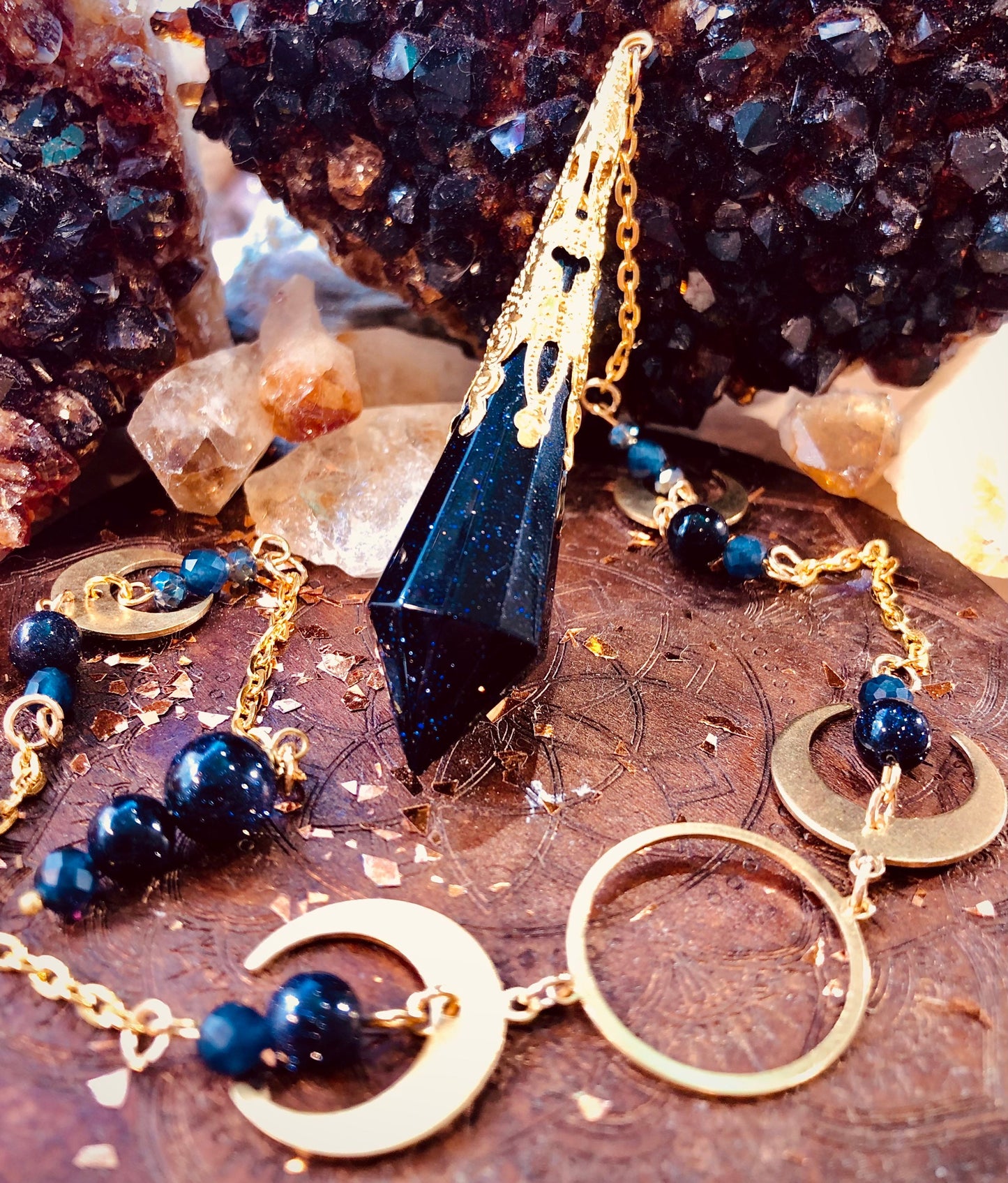 Fairy pendulum with night stone and faceted blue sapphire